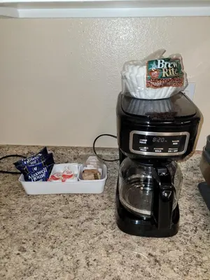 a coffee maker sitting on top of a counter with food at Alpaca Rustic Ranch-peaceful & breathtaking views in Santa Clarita