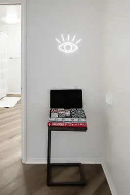a table in a room with a laptop on a wall at 2BDR Home Away From Home in Marina del Rey in Los Angeles