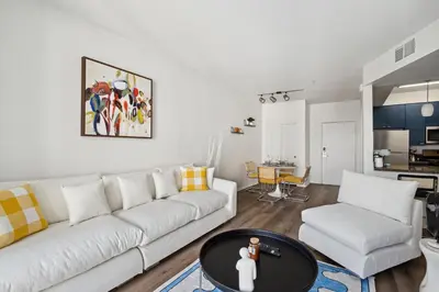 a living room with a white couch and a table at 2BDR Home Away From Home in Marina del Rey in Los Angeles