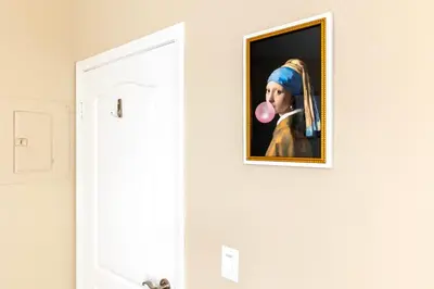 a painting of a woman with a pink tongue on a wall at Marina del Rey 1bdr Retreat with pool, gym, free parking in Los Angeles