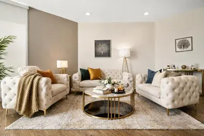 a living room with two couches and a table at Venice Marina Water Front Luxury Condo in Los Angeles