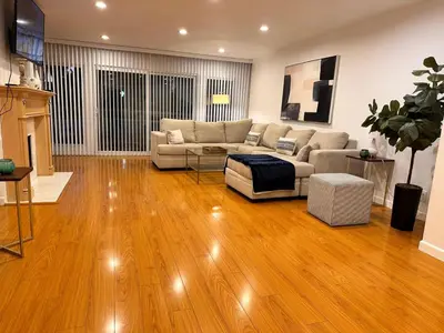 a living room with a couch and a table at Coastal haven retreat in Los Angeles