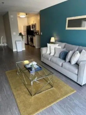 a living room with a couch and a coffee table at 2-Bedroom Hollywood Apartment in Los Angeles