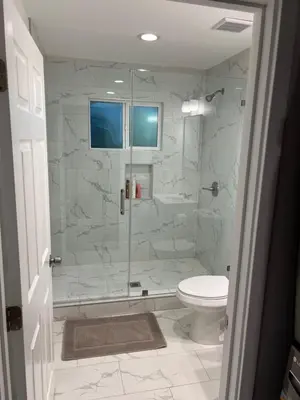 a bathroom with a glass shower with a toilet at Private gated 1bed & 1bath amazing for 2 in Los Angeles near Universal studio & Hollywood in Van Nuys Airport