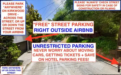 a bunch of street signs on a street with at Enchanting Gated Hollywood Hills Oasis with Tranquil Treet-Top Views, Outdoor Living Room and Patios, Magical Zen Garden, Plus Bonus Romantic Guest House and Free Garage in LA's Most Desirable Central Serene Area, Sleeps 8-10 in Los Angeles