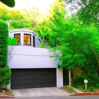Enchanting Gated Hollywood Hills Oasis with Tranquil Treet-Top Views