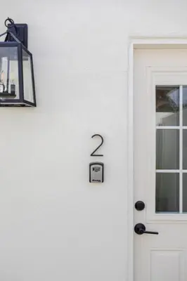 a white door with a number on it at Cute Guest Studio near Universal Studios sleeps 4 in Los Angeles