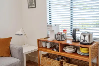 a living room with a table with a coffee maker at Cute Guest Studio near Universal Studios sleeps 4 in Los Angeles