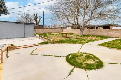 a park with a picnic table and a bench at Work, Play and Relax Home with Yard in Lancaster! in Lancaster