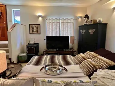 a living room with a bowl on top of a couch at ADELAIDE HILL IN PINE MOUNTAIN CLUB BREATHTAKING VIEWS 3Bd 3Bth SPA TUB in Pine Mountain Club