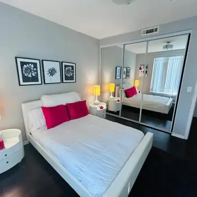 Cozy private room and bathroom in prime location with rooftop views 30 day stays or more