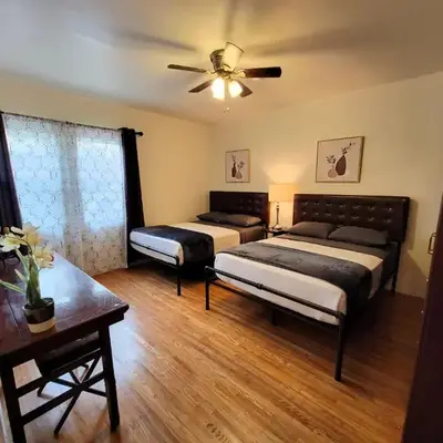 Perfectly located Pico Robertson ground floor 3 bedroom apartment Walk to restaurants WIFI TV Game Console Parking 5 minutes to Rodeo Drive