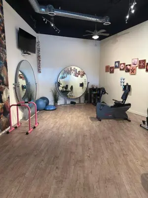 a room with a gym with a treadmill and mirrors at Oceanfront 1 Bed 1 Bath , Parking, Stunning View 337 in Redondo Beach