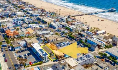 an aerial view of a beach and the ocean at Beach House Steps to the Sand! in Manhattan Beach