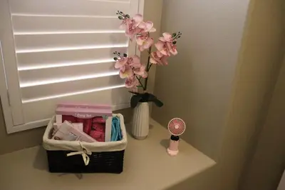 a vase of flowers and a vase of pink flowers at Pretty Relaxed Me in Brea