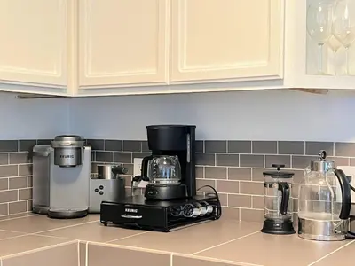 a kitchen counter with a coffee maker on it at Tranquil and Secluded Retreat in Topanga Canyon in Topanga