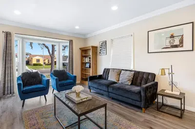 a living room with a couch and two chairs at Comfy Home Near Sofi Stadium 2 in Los Angeles