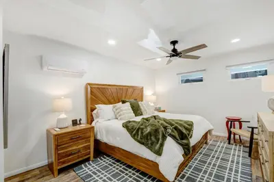 a bedroom with a bed and a ceiling fan at Peaceful 5-Acre Stay - The Emerald Grove Retreat in La Verne
