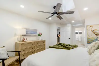 a bedroom with a bed and a ceiling fan at Peaceful 5-Acre Stay - The Emerald Grove Retreat in La Verne