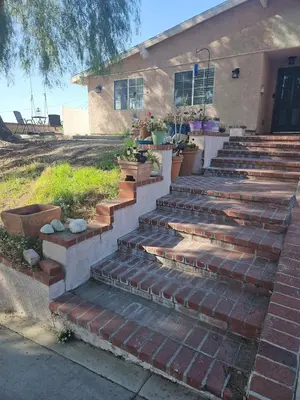 a set of stairs in front of a building at Modern 1-bedroom Studio with Full Kitchen and Bath in Santa Clarita