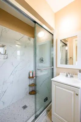 a bathroom with a shower and a sink at Modern 4B Retreat with Cozy Decor in Upland