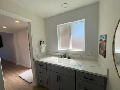 a bathroom with a sink and a window at Rancho del Cielo in Twin Lakes