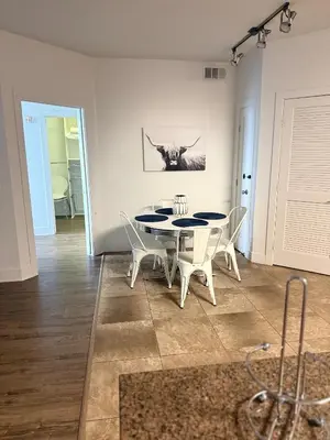 a dining room with a table and chairs at Villa Marina - AMAZING Modern, Spacious, Stylish 2 Master Suites in CENTRAL Marina Del Rey in Los Angeles