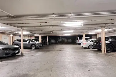 a parking garage with cars parked in it at Serenity Retreat in Santa Monica in Los Angeles