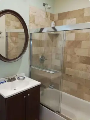 a bathroom with a shower and a sink and a mirror at Nice Room Near Citrus College in Glendora