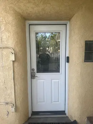 a white door with a window on a building at Nice Room Near Citrus College in Glendora