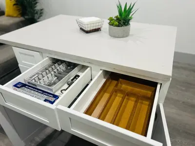 a white kitchen island with an open drawer at Newly Built Stylish Modern 2B In LA in North Sherman Way