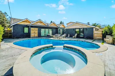 a swimming pool in the backyard of a house at Tulum Style in Sherman Oaks in Garnsey