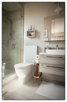 a bathroom with a toilet and a sink and a shower at Luxury Living in West Hollywood Modern 3BR Home w Pool & Hot tub in Los Angeles