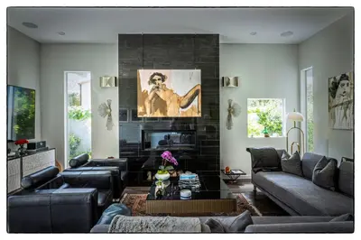 a living room with couches and a fireplace at Luxury Living in West Hollywood Modern 3BR Home w Pool & Hot tub in Los Angeles
