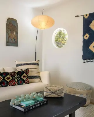 a living room with a couch and a coffee table at Sunny Getaway and 10 Min to SB in Summerland