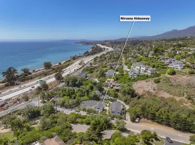 an aerial view of the beach and the ocean at Sunny Getaway and 10 Min to SB in Summerland