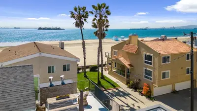 an aerial view of a house and the beach at Beach Paradise - Stunning 3-Story in Long Beach in Long Beach