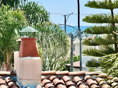 a vase sitting on top of a roof at Beauty by the Beach - SoCal Fun in Long Beach