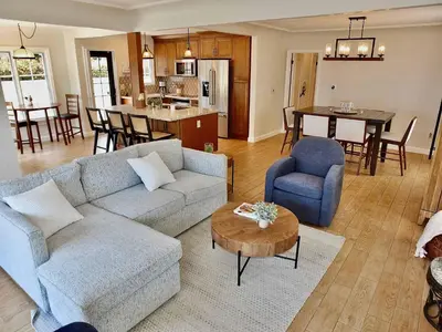 a living room with a couch and a table at Belmont Shore Beach House - Incredible Oceanfront Views in Long Beach