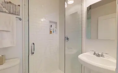 a bathroom with a shower and a sink at Steps to Beach & Alamitos Bay on LB Peninsula in Long Beach