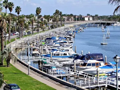 a bunch of boats are docked at a marina at Sand Sun & Second - Charming Studio within Walking Distance to Beach in Long Beach