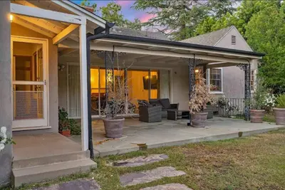 a screened in porch of a house at The Otsego Hideaway in Los Angeles