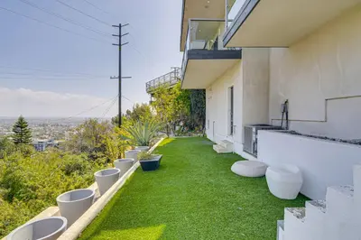 a row of toilets on the side of a building at Walk to Sunset Strip Modern Home in WeHo Hills! in Los Angeles
