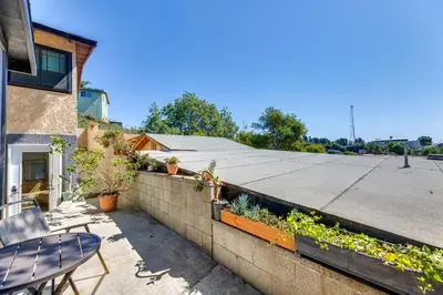 a retaining wall with plants on a house at 5 Mi to Dtwn Los Angeles Apt with Outdoor Space! in Los Angeles