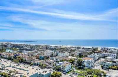 an aerial view of a city and the ocean at Oceanfront Bliss, Beach & Marina Views, Roomy 1BR in Los Angeles