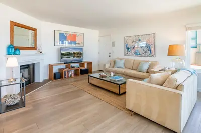 a living room with a couch and a coffee table at Carpinteria Dreamin by Paradise Retreats in Carpinteria