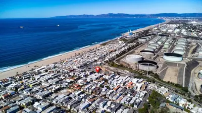 an aerial view of a beach and the ocean at Luxury Ocean View Condo Steps To The Sand VIEWS in Manhattan Beach