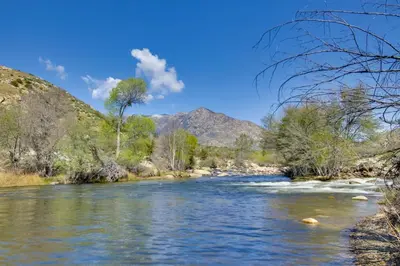 a river in the desert with mountains in the background at Walk to Riverfront Beach Kernville Escape in Kernville