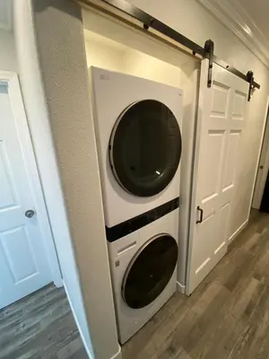 a washer and dryer in a room at HubCityJewel in Compton