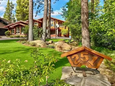 a house with a sign in front of a yard at Bear Lake Lodge #2547 in Big Bear Lake